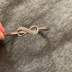 a silver infinite bracelet